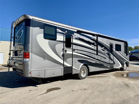 As one of the most unique coaches on the market, the Canyon Star is filled with interesting amenities from the cockpit to the garage in the back. Beyond the garage floor plans, which can be converted to additional living or sleeping space, there’s also an Xite Dash Radio with Apple CarPlay ® , Samsung ® LED TVs, glazed maple cabinets, and .... 