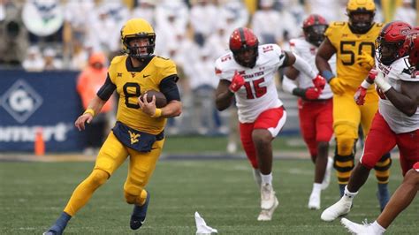 Nicco Marchiol throws TD pass in 1st start, West Virginia holds off Texas Tech 20-13