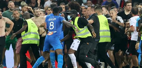 Nice, Marseille game halted by bottles, pitch invasion and brawl