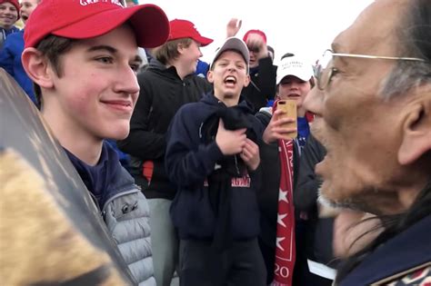 Aug 26, 2020 · Nick Sandmann, a student from Covington Catholic High School, stands in front of Nathan Phillips, a Native American protester, in Washington, D.C., on Jan. 18, 2019. (Kaya Taitano/social media/via ... 