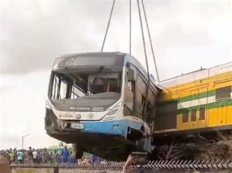 Nigeria bus crashes into train; 6 dead and dozens injured