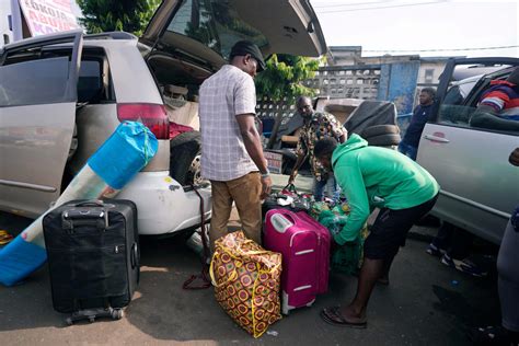 Nigeria slashes transport fees during the holidays to ease some of the pain of austerity measures