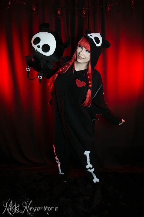 Nikki Nevermore - Modeling the skelanimals onesie and.