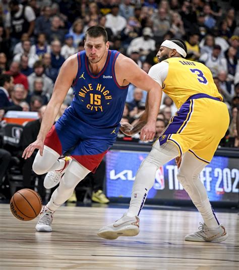 Nikola Jokic’s triple-double brings playoff magic back to Denver in Nuggets’ opening-night win over Lakers