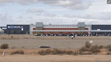 Nikola phoenix.  plans to lay off 855 workers between its Phoenix head...