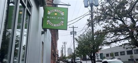 Nine Pin Cider Works volunteers to cleanup the Warehouse District for Earth Day