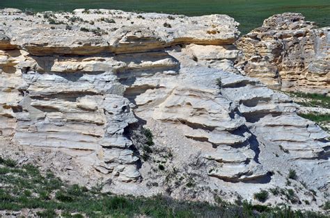 Niobrara Formation. The Niobrara formation, consisting of a series of chalky beds, crops out only in the extreme northwest corner of Russell County, where a maximum thickness of about 100 feet remains uneroded. The lower part consists of massive beds of chalk containing few impurities, white and rather soft above and tan and harder below; the .... 