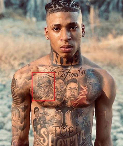 Nle choppa neck tattoo. 13 Sep 2021 ... One of the most visible tattoos is NLE on his neck. During a GQ interview in 2020, NLE Choppa broke down his tattoos and explained why his ... 