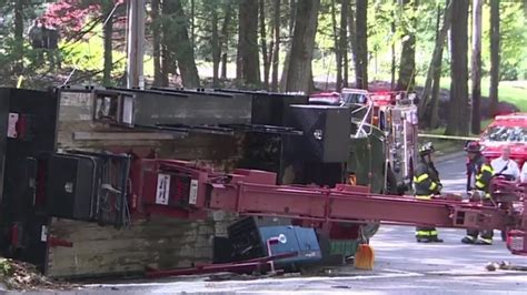 No injuries after bucket truck tips over in Concord, Mass.