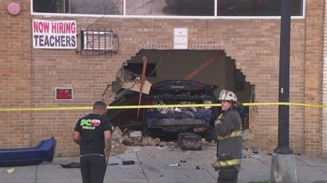 No one hurt after car crashes into daycare in Quincy