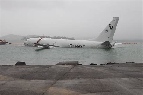 No one was injured when a US Navy plane landed in a Hawaii bay, but some fear environmental damage