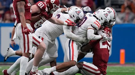 No. 14 Arizona to face No. 12 Oklahoma in Alamo Bowl two years after a one-win campaign