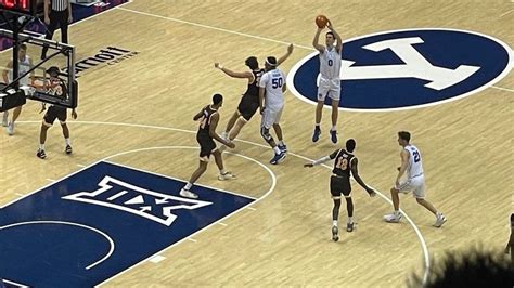 No. 14 BYU blasts former conference rival Wyoming 94-68 for fourth straight win