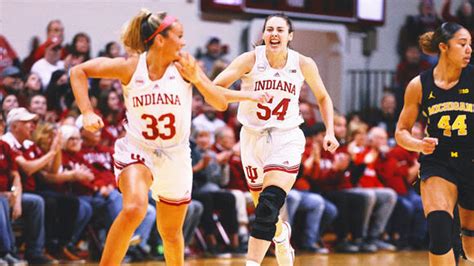 No. 14 Indiana women perfect from field in first quarter, rout Michigan 80-59 for 11th straight win