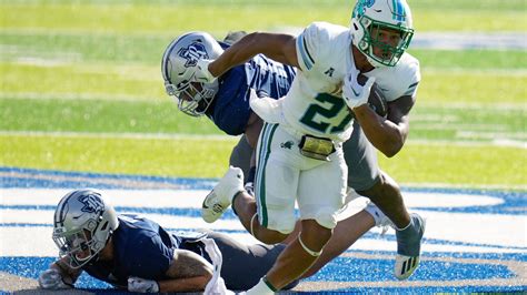 No. 21 Tulane visits East Carolina looking to stay unbeaten in AAC race