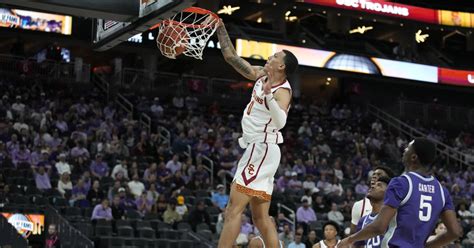 No. 21 USC opens season with 82-69 win over Kansas State as Bronny James watches from the bench