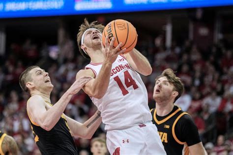 No. 21 Wisconsin uses strong 2nd half to beat Iowa 83-72 for 3rd straight win