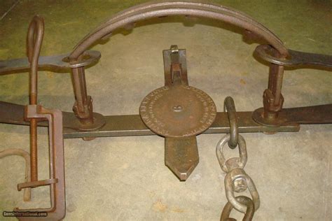 Rare Antique S. Newhouse No. 5 Bear Trap. Antique S. Newhouse No. 5 Bear Trap, with chain and ring. Beautifully maintained and oiled With Highly Embossed Emblem. Measure 34" x 12" x 7.5". Previous Sale Results On This Platform For A #5 & #6. See Sold Price.. 