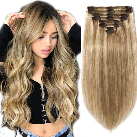 The S-noilite clip-in hair extensions are lightweight and super easy to use. They are made of 100% Brazilian human hair with standard weft to prevent shedding. The silky straight locks measure 24 ….