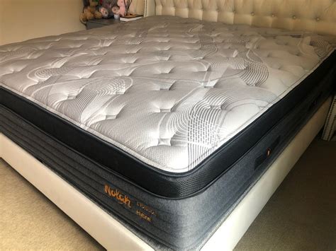 Nolah mattress. Nolah Original Hybrid Mattress Overview. The Nolah Original Hybrid is an 11-inch tall mattress made with foam and coils, with a Tencel cover. The bed has a medium-firm feel, with some cushioning in the top layer and lots of support from the pocketed coils. 