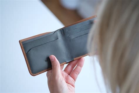 Normest wallet review. Many wallets today sport additional or build-in AirTag holders, but this bifold from Normest is fantastic for its versatility — able to hold 25 cards and 50 bills — and its slim profile. Featuring RFID-blocking capabilities, the wallet also has a super secure AirTag compartment that snaps right on. 