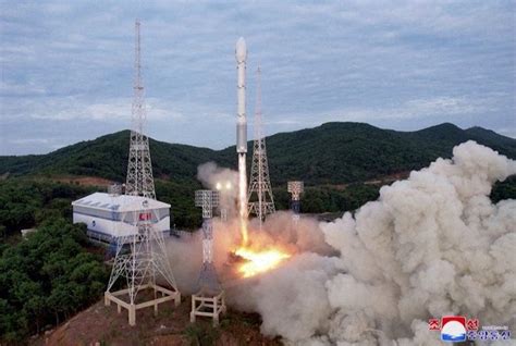 North Korea conducts rocket launch in likely 2nd attempt to put spy satellite into orbit