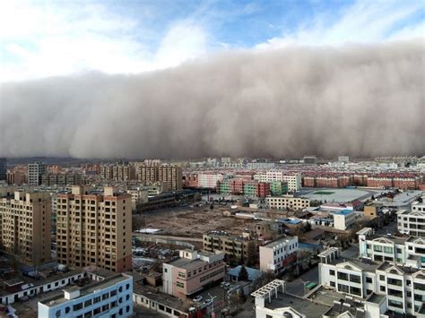 Northern China blanketed with floating sand and dust