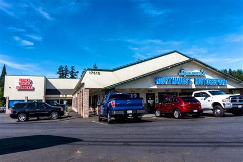 Puyallup's Northwest Motorsport will pay a former empl