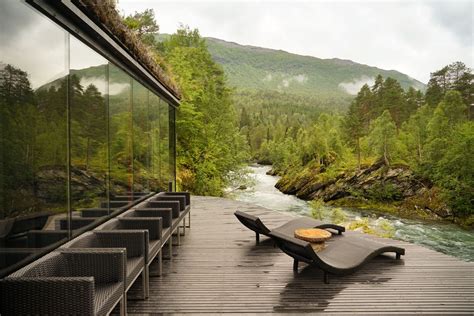 Norway juvet landscape hotel. The hotel is located in Valldal, Norway. It has won many accolades for its achievement in architecture. According to the website , the hotel has 24 beds, a bathhouse, a writing lodge, and much more. 