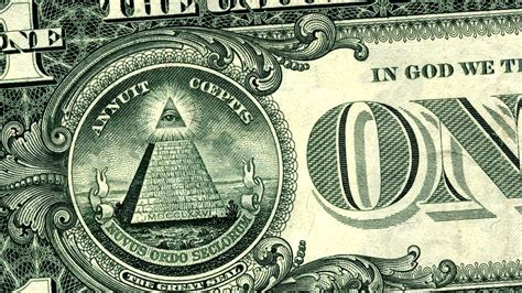 Novus Ordo Seclorum. this is a pyramid with a eye. "Macro photo of a one dollar bill and the reverse side of the Great Seal featuring the Eye of Providence (the All-Seeing Eye). Taken at an angle with a macro lens on a 21MP camera. Shallow DOF with nice bokeh..