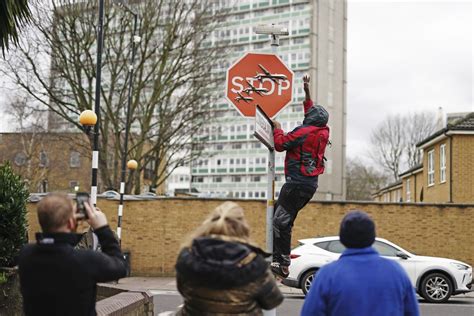 Now you see it, now you don’t: Banksy stop sign taken from London street soon after it appears
