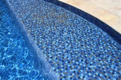 Npt glass tile. Blue Seas - Light Blue - 6" x 6". Capture the peace of shallow water and gentle waves in your backyard using this light blue pool tile. Glossy pool tile. Available in 6" x 6" bullnose tile. Resistant to water, frost, changing temperatures, chemical damage and fading. 