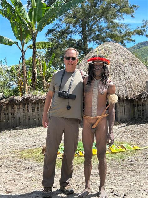 Nude man playing with his penis in africa. .  ...