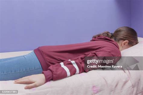 Nude teen laying face down.  Less Searching, More Finding With Getty Images.  G...