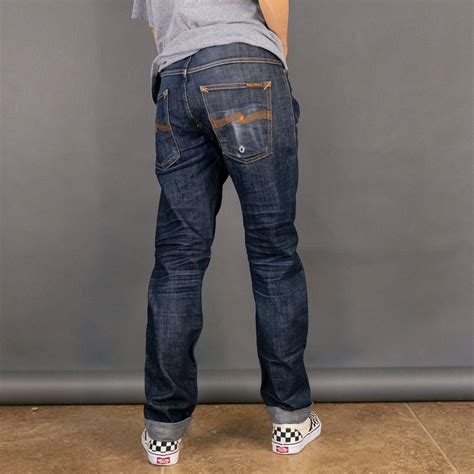 Nudie jeans nudie jeans. Hazy Hank is our take on the classic bootcut, slim fit. The silhouette is slim across the front, back, and down the thigh. And from slightly above the knee, there’s a smooth increase in width, creating a subtle bootcut flare. Wear them short for a modern take, or go classic with a proper length. We make Hazy Hank exclusively with rigid denim. Check out Hazy Hank in our fit guide. 