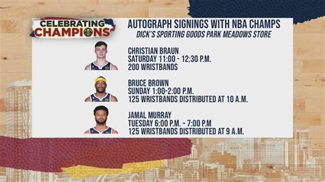 Nuggets players signing autographs for fans this weekend