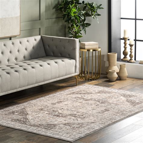 nuLOOM Justine Vintage Medallion Area Rug $256.99When purchased online In Stock Add to cart About this item Highlights 100% Polypropylene, made in Turkey Designed with resilience against everyday wear-and-tear, this rug is kid and pet friendly and perfect for high traffic areas of your home such as living room, dining room, kitchen, and hallways.