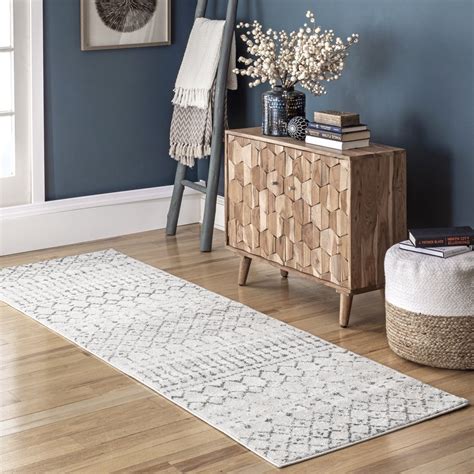 2' 6" x 8'. 2' 6" x 12'. Quantity. Add to cart $19.00. At nuLOOM, we believe that floor coverings and art should not be mutually exclusive. Create a cozy yet fashionable statement with our tasseled shag area rug. The plush pile feels luxurious underfoot and the braided tassels lining the ends add a bohemian feel..