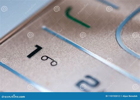 Numbers and Letters on an Old Used Golden Mobile Stock Image Image of