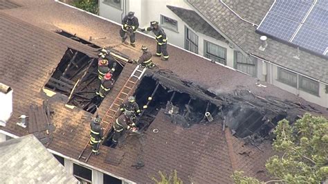 Oakland firefighters respond to house fire on 39th and West
