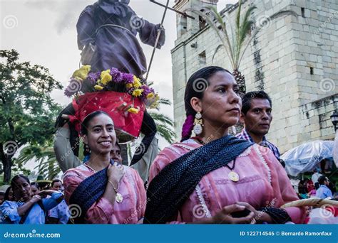 People leave the auditorium at the end of the first day of the Guelaguetza festival in Oaxaca City, Monday, July 17, 2023. During the government-sponsored event, 16 Indigenous ethnic groups and the Afro-Mexican community promote their traditions through public dances, parades and craft sales.. 