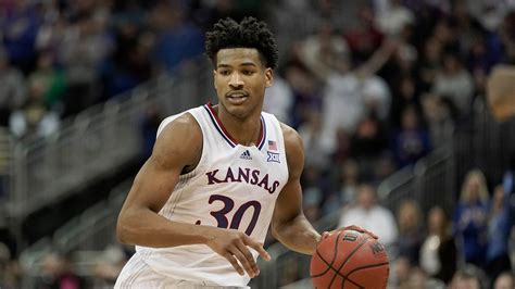 Ochai Agbaji is a college basketball player at the University of Kansas. Agbaji has been the shooting guard for the team since 2018. Born in Milwaukee, Wisconsin, Agbaji grew up playing soccer and basketball. He graduated from Oak Park High School in Kansas City, Missouri, and was named Kansas City Star All-Metro player of the year.. 