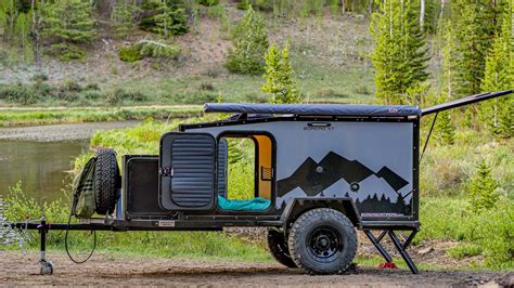 5) Jeep Off-road Travel Trailer. An off road travel trailer has fou