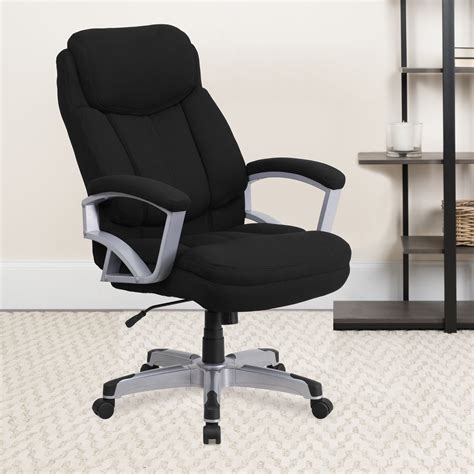 Office chair big and tall. Pour your morning cup of coffee as you prepare for another successful workday dwindling down your tasks. With a wider seat and back, this ergonomic big and tall chair accommodates longer limbs to sit comfortably without restricting mobility or efficiency. The heavy-duty chair base holds up to 400 pounds to comfortably support all body types. … 
