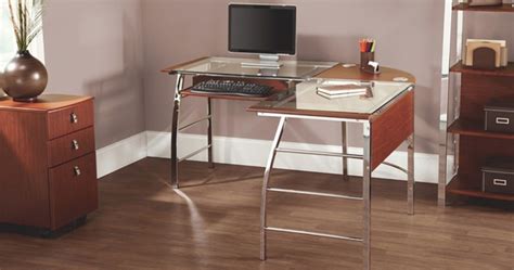 Office depot glass desk. With a spacious surface, this Realspace Zentra main desk is the centerpiece of your workspace. Top surface of this desk has been tested to support up to 120 pounds (54.4 kg). Zentra desk features a tempered clear glass frosted border. Silver powder coat metal frame. Assembled Dimensions: 48"W x 28"D x 30"H. 
