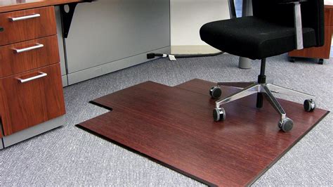Office floor mat. Designed for use on hard floor surfaces only, do not use on carpet. Lip shape for extended under desk coverage, 36"W x 48"L. Made with clear vinyl to allow the beauty of your floors to show through. Textured underside to reduce mat movement on hard surfaces. Protects hard floor surfaces such as laminate, wood, and tile from chair caster wear ... 