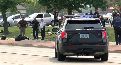 Officer killed and 2 police injured in shooting that also left suspect dead on a North Dakota street