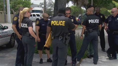Officers fire at man for shooting rifle in Miami; Suspect rushed to hospital
