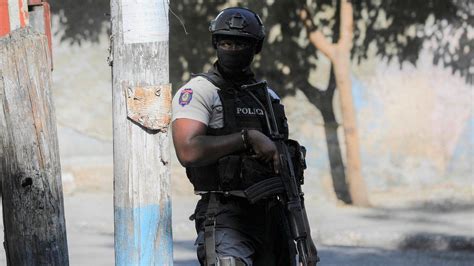 Official: Suspected gang members kill Haitian policeman amid spike in violence
