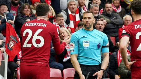 Official stood down after clash with Liverpool’s Robertson